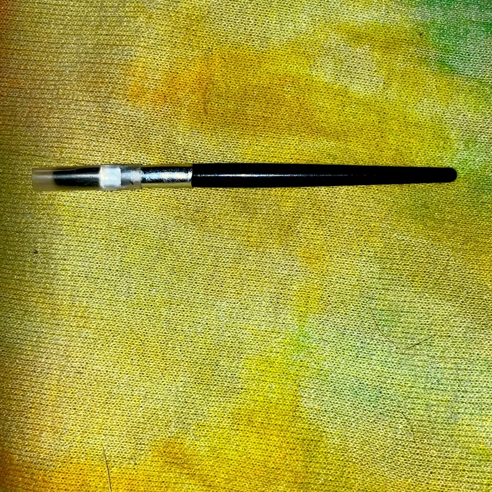black, very small makeup brush